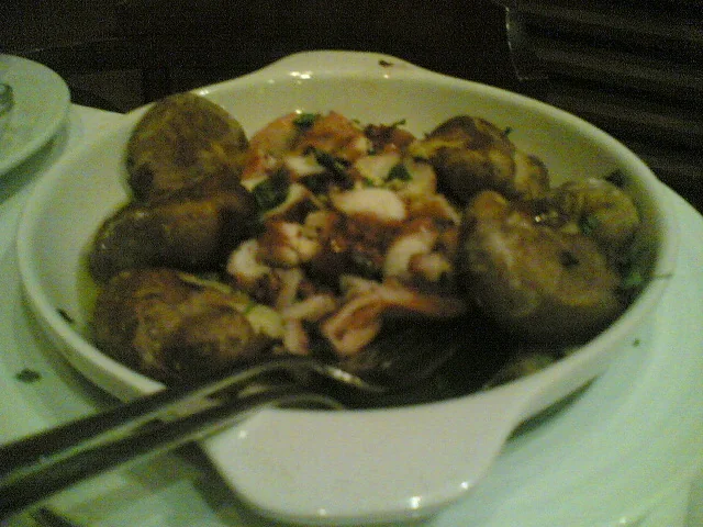 Polvo a lagareiro with octopus and potatoes.
