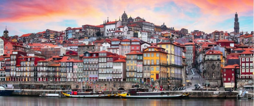 Ribeira riverfront in Porto with historic buildings facing the Douro.