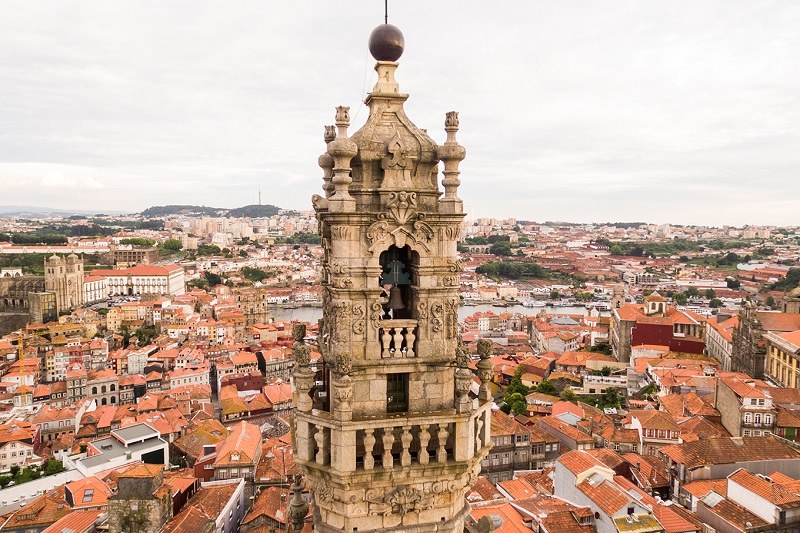 Clerigos Tower rising above Porto's red rooftops.